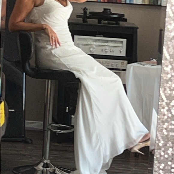 Size 12, taken in wedding dress ivory - Picture 3 of 3